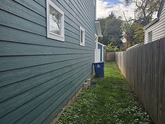 Side yard access leading to garage.