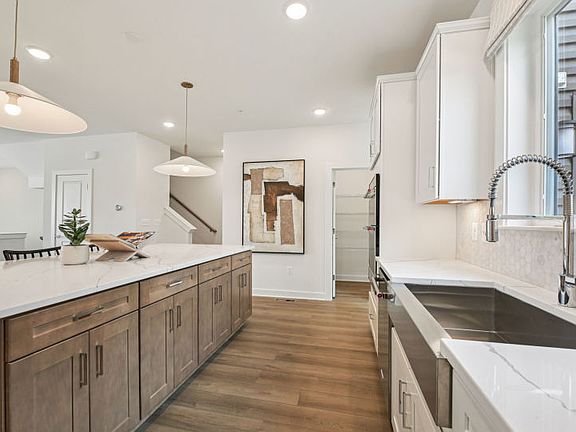 Rear Kitchen with Stainless Steel Appliances