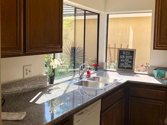 Kitchen with granite counter tops.
