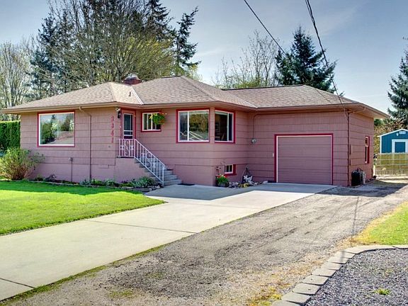 Newer concrete driveway installed 2010.   The 40 year roof was installed in 2007. The gravel drive leads to the back yard, workshop and covered RV parking.