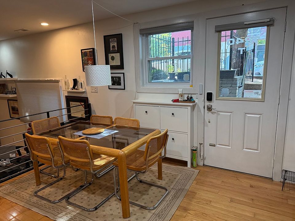 Enter into space for a full dining room, with great morning light and automated shades for privacy when desired.