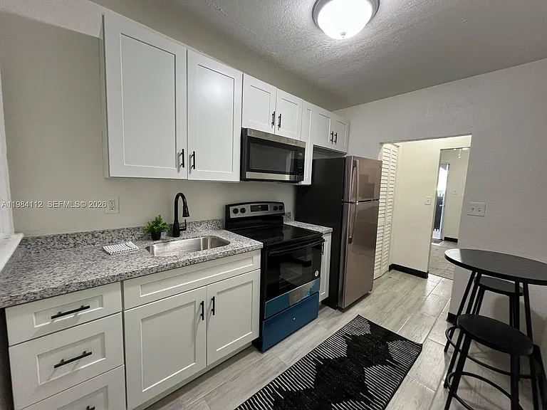 140 NW 13th St #148-1/2 — Photo 11