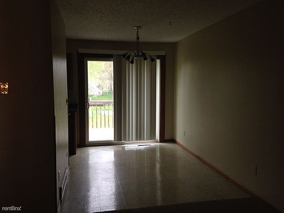 Dining Room off the kitchen. Patio door goes to the backyar