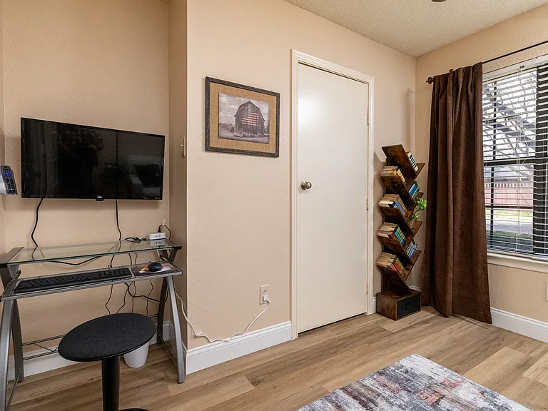 Office with closing french doors - monitor, keyboard, mouse, and office supplies for when you need to have work away from the office