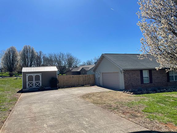 Enclosed Double Garage and Shed with Fully Fenced Yard