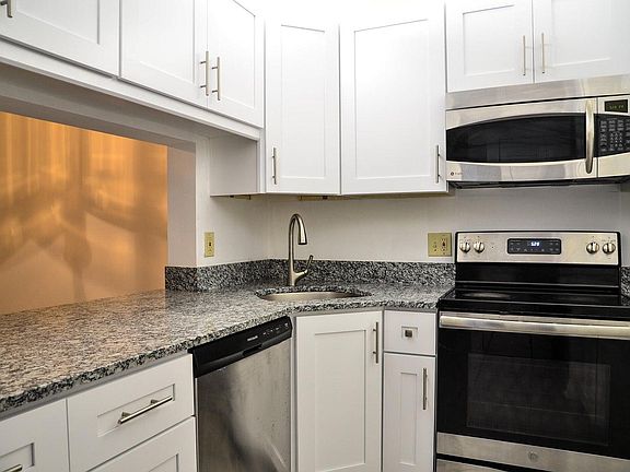 Kitchen counter opens to dining room