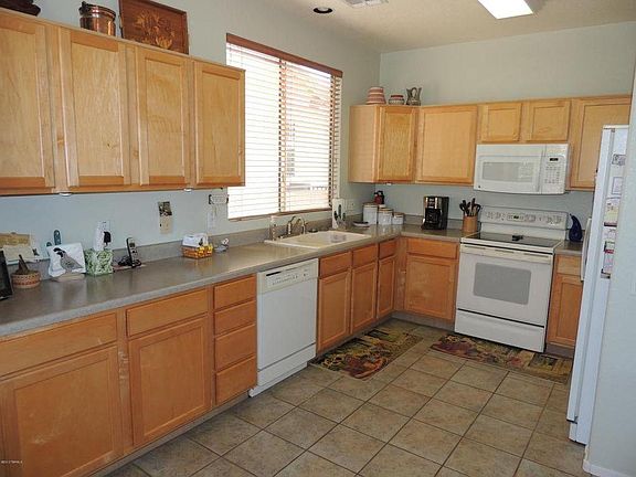 4th image of 7662 W Desert Cactus Way #1