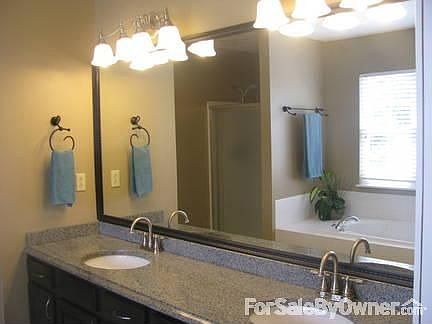 Master bath
						:
						Granite tops, dual sinks, whirlpool tub with separate shower. Updated fixtures.