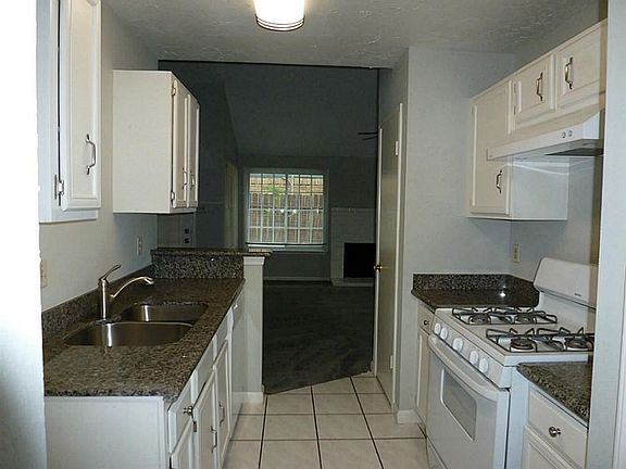 Cozy kitchen with beautiful new granite counter, under mount sink and fixtures
