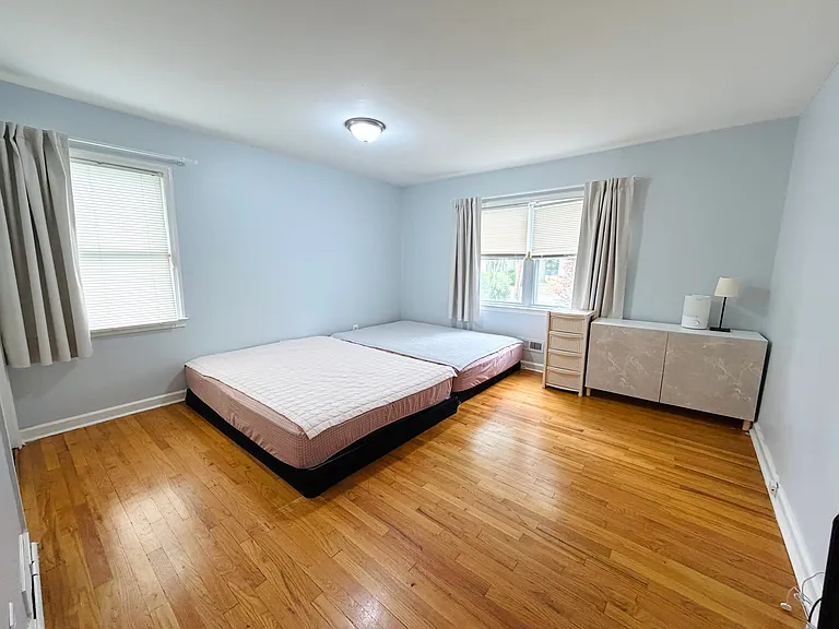 Large 1st Floor Bedroom #1 with gleaming hardwood floors