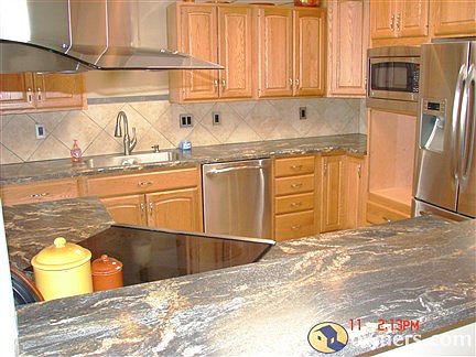 Newly remodeled kitchen with stainless steel appliances.