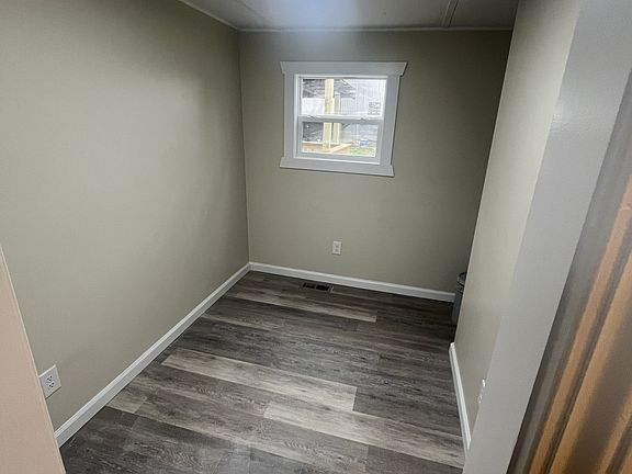 This bedroom is small and best used for storage.