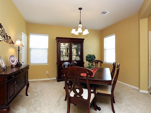 Room to entertain a crowd in this large formal dining room