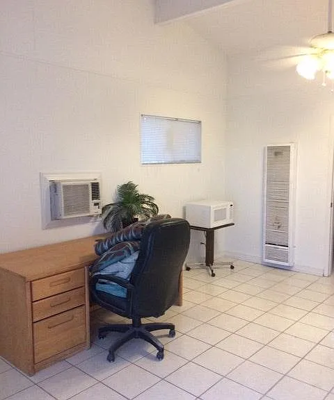 Includes desk and chair.
Also includes microwave .