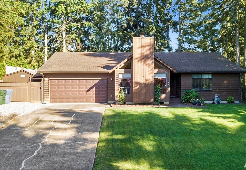 Beautifully maintained yard welcomes you home to this charming abode.
