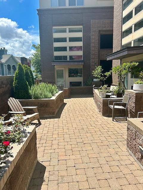 Outdoor common area with it's own sitting area and indoor/outdoor fireplace.