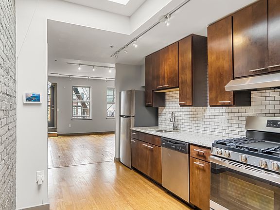 Apt Kitchen - Granite Countertops, subway tile, stainless steel appliances