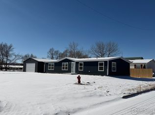 125 Birch St, Log Lane Village, CO 80705