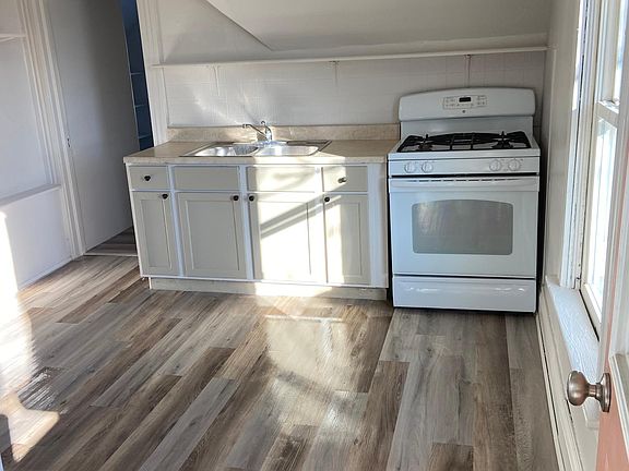 Kitchen as you walk into the apartment.