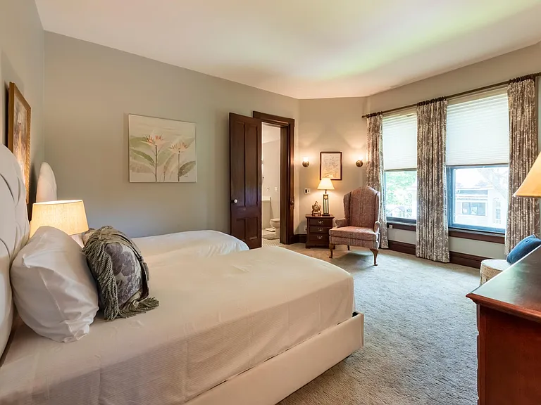 Bedroom with 2 single beds, private bath and great light!