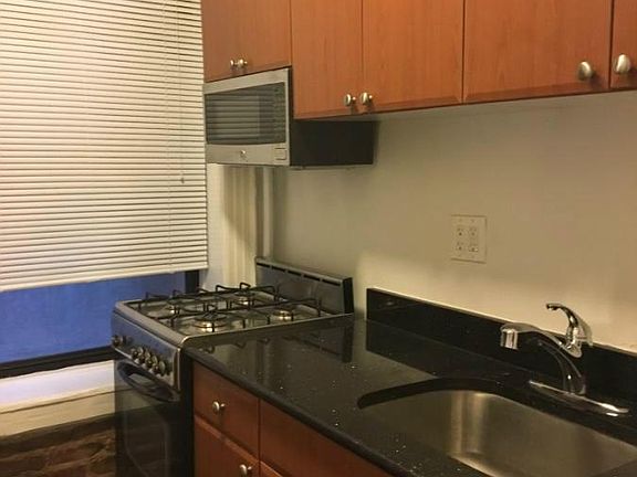5th image of 224 E 12th St APT 1