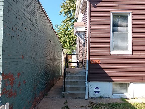 Side entry to house. One of three.