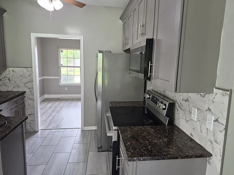 3914 Spearmint Ln NW — Photo 31