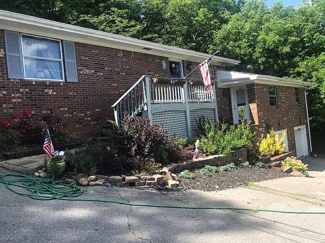 Brick ranch style home - one level. Garage.