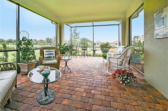 Extended lakefront lanai with extra large covered area and open screened area.