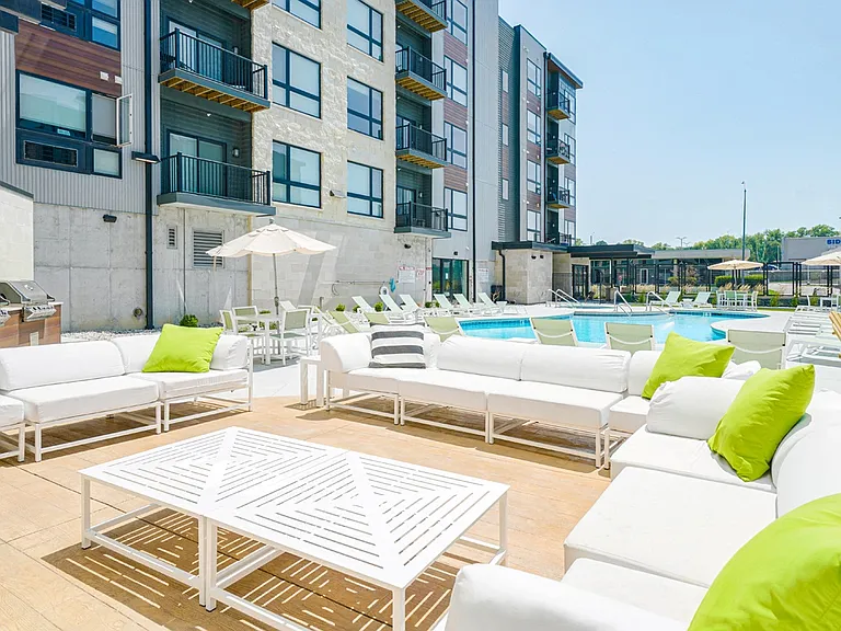 Outdoor seating spaces are perfect for lounging by the pool.