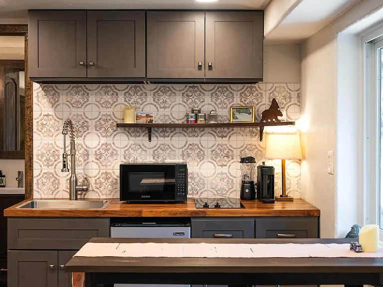 Microwave, toaster, blender, Keurig, kettle, pots/pans, dishes, wine glasses, etc.