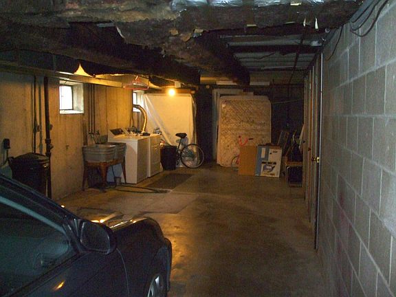 basement w/laundry, storage and garage