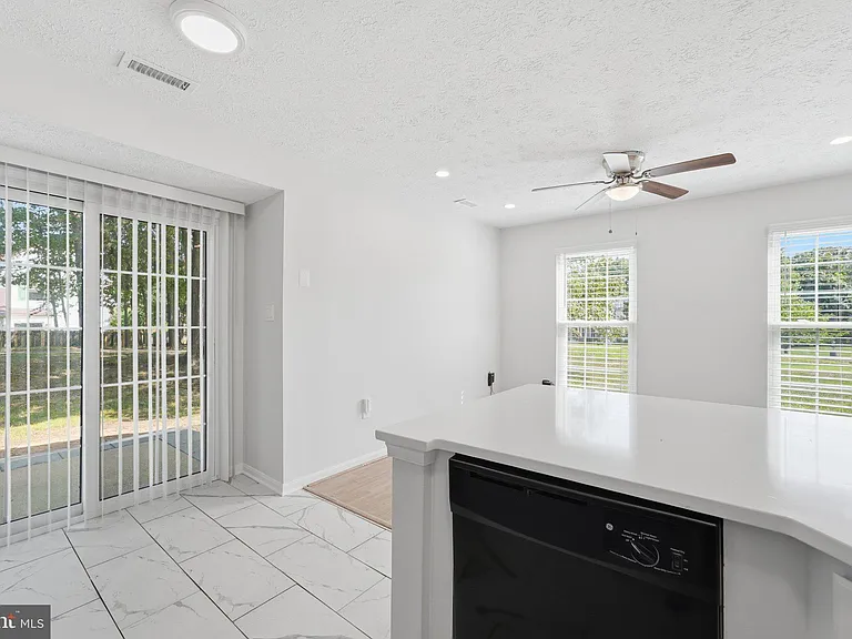 E Rosecroft Village Cir — Photo 10