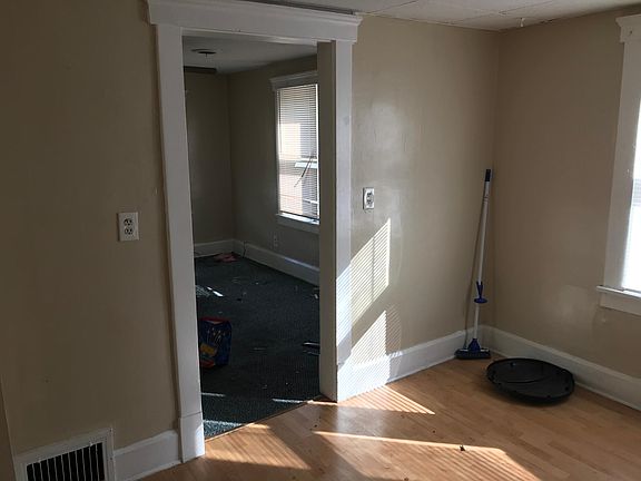 Kitchen to spacious living room! (Blinds have been replaced since picture was taken and photographer was fired)