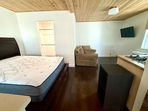 Comes furnished with bed, loveseat, dresser and flat-screen TV