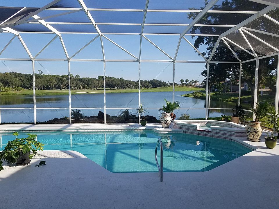 Pool and Hot tub in Screened lanai