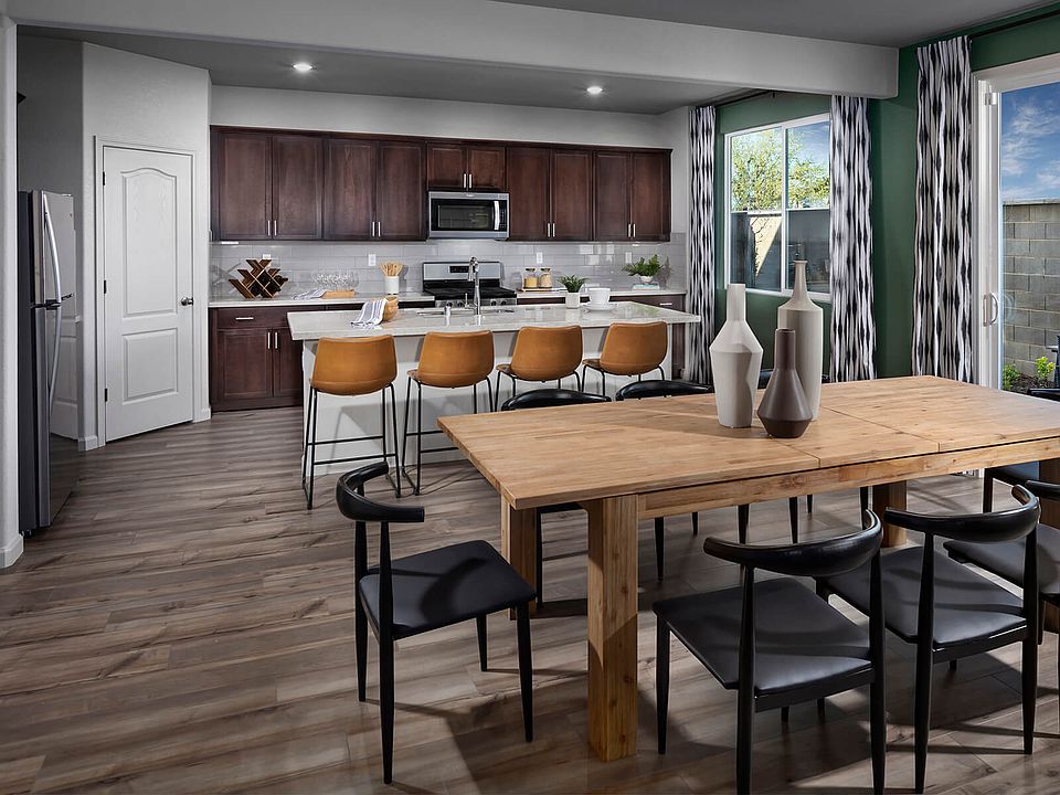 Residence 2 dining room modeled at a nearby Meritage community.