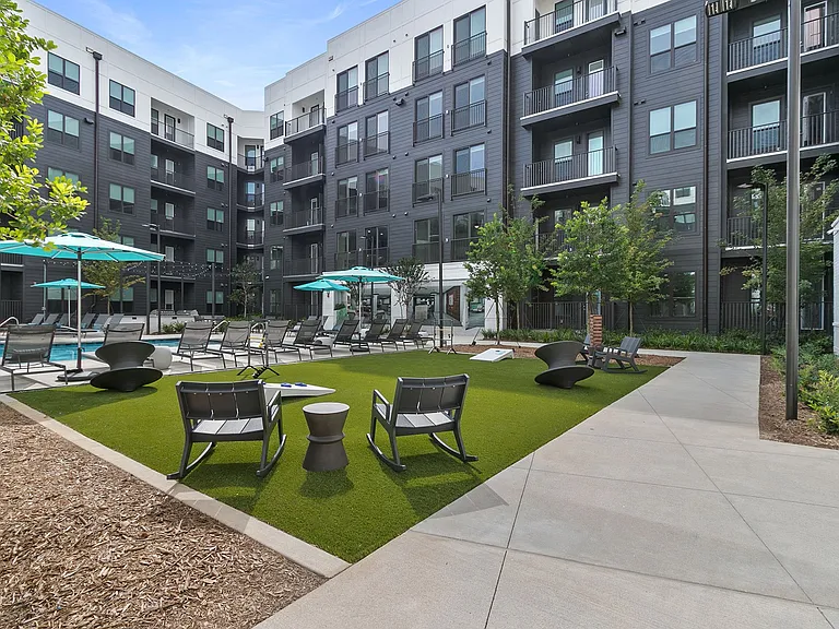 Courtyard lounges featuring lawn games & Grills