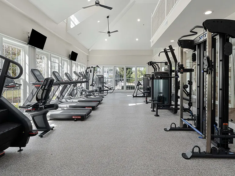 Fitness Center with cardio and weight machines.