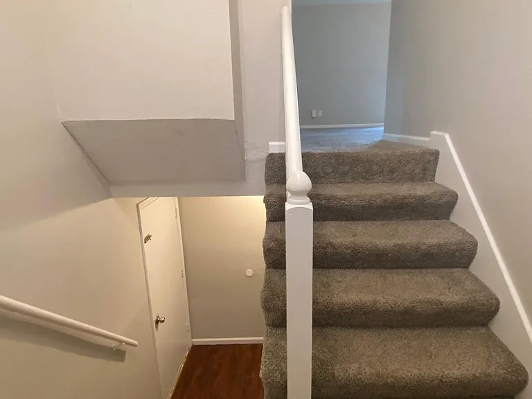 stairway to living room and basement