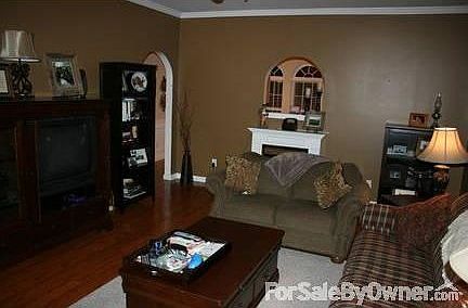 Living Room
						:
						Spacious living room with view into kitchen