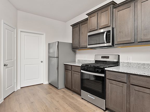 The kitchen of the Cypress has energy-efficient appliances.