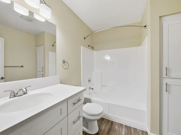 A Hallway Premium Bathroom at Midway Gardens Apartments