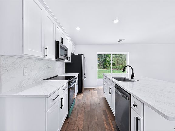 5th image of 7686 Gifford Rd
