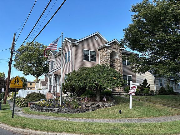 Flag Pole View of House