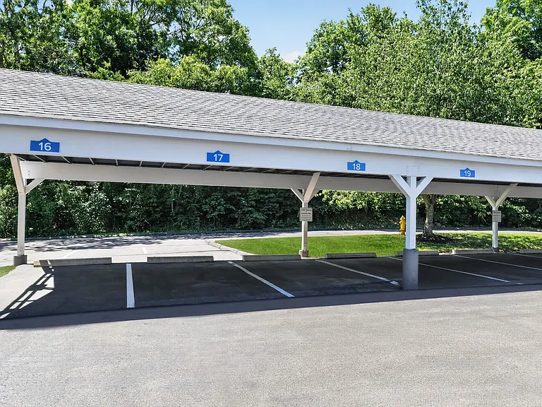 Elevate your lifestyle at Summit at Mill Ridge with convenient covered parking options. Enjoy the perfect blend of comfort and accessibility in a serene setting. Secure your spot today and embrace elevated living!