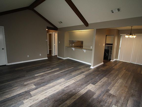 Living Room With Cathedral ceilings, pass through bar to Kitchen