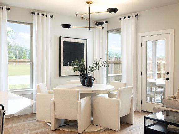 Dining Space with Backyard Patio Views