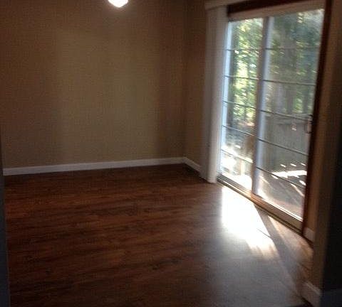 dining room with sliding door to the deck