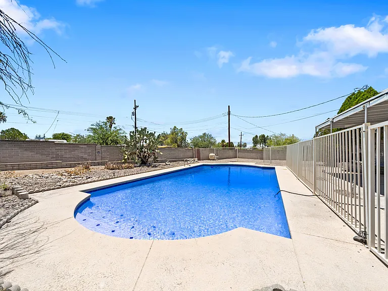 Take a dip in your huge private pool, the ultimate Arizona summer upgrade.